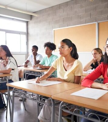 group students different ethnicities sitting class