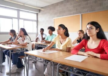 group students different ethnicities sitting class